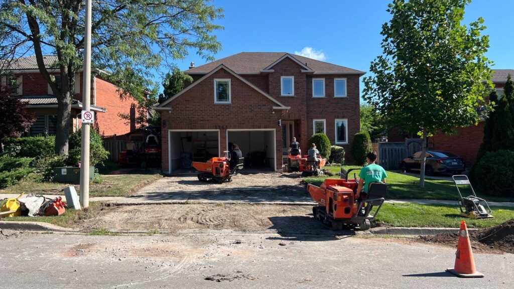 Photo of an Interlock driveway installation in process