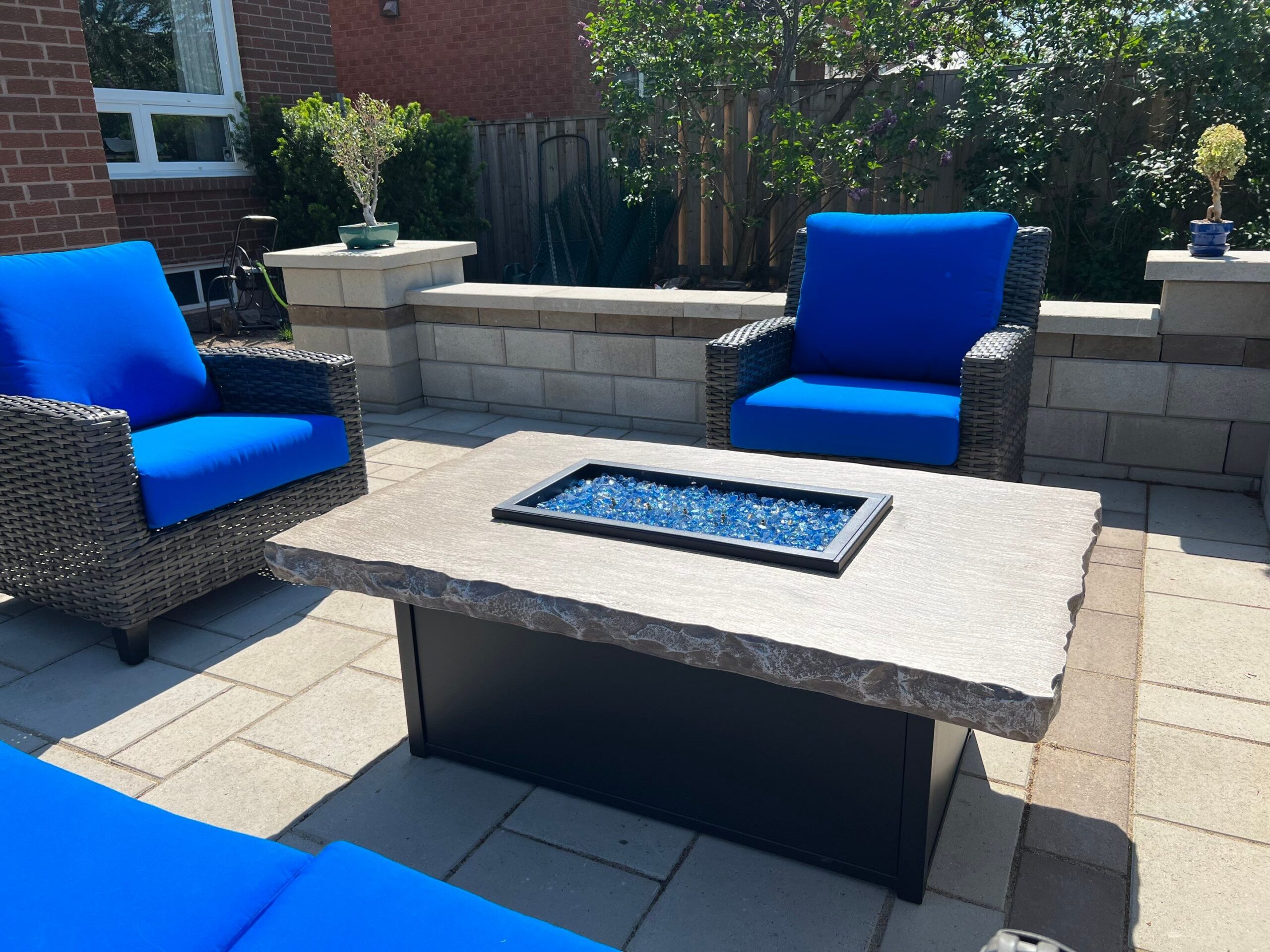 Interlocking Knee Wall with Pillars Around Fire Feature