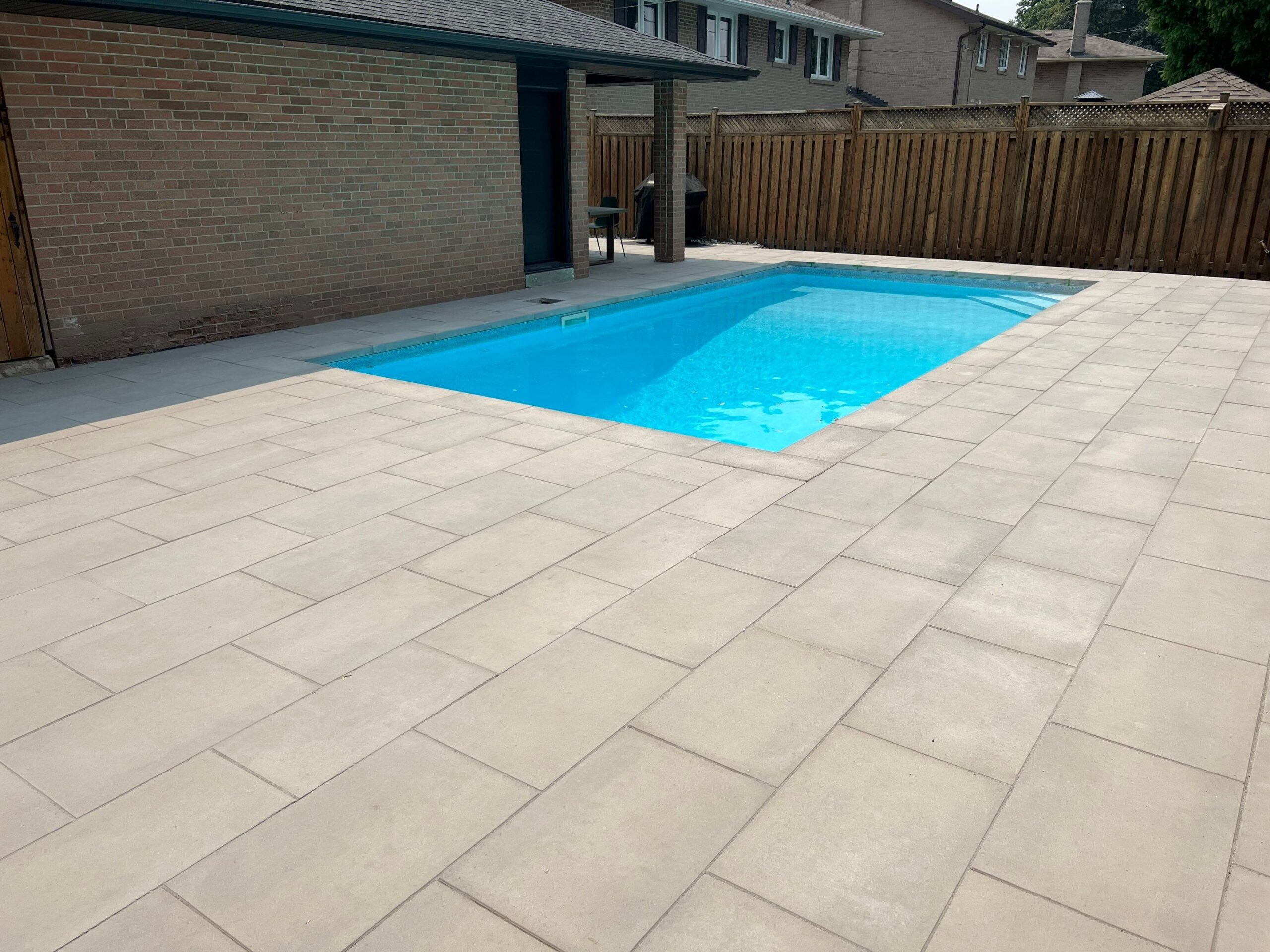 Linear Pattern Interlocking Paver Pool Deck