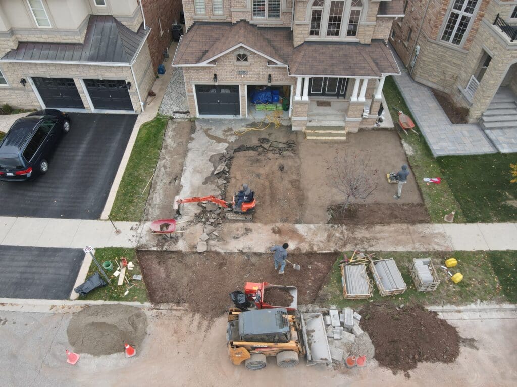 Removing-asphalt-driveway-using-bobcat