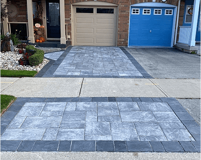 Property exemplifying interlocking paver stone work on a small driveway