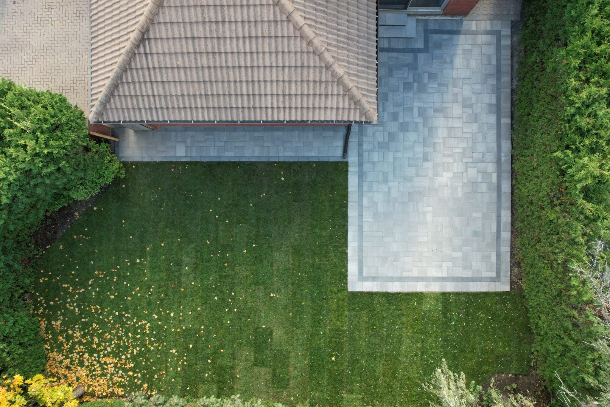 Clean backyard interlocking patio after professional maintenance and sealing in Mississauga.
